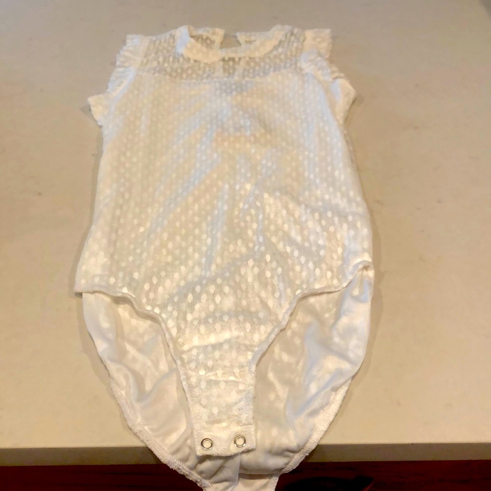 Beautiful bodysuit never been worn !
